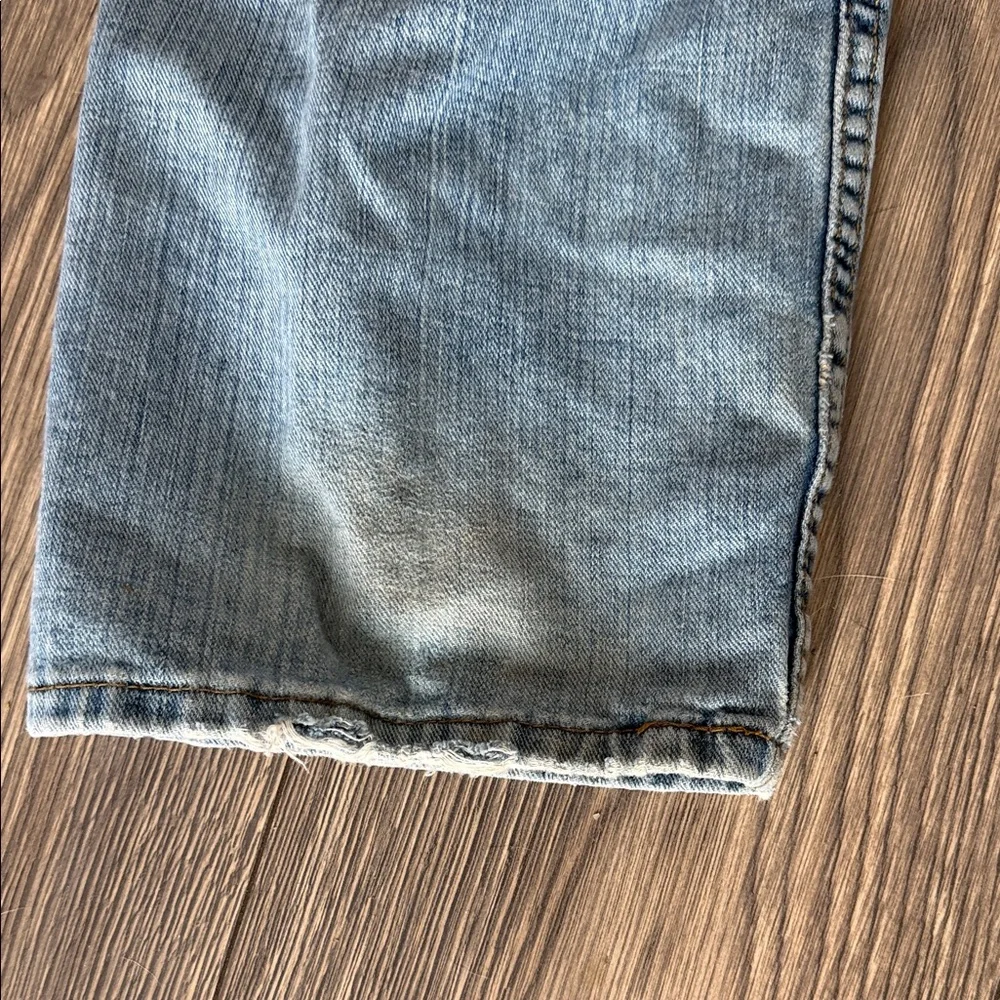 Levi's Light Blue Straight Jeans with Distressed Details